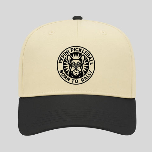 Beige and black cap with a pickleball logo on a light gray background